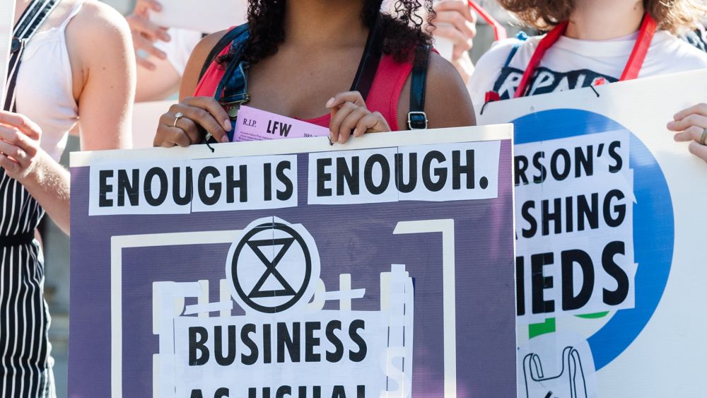 Extinction Rebellion activists stop traffic outside the Foreign Office ahead of Victoria Beckham's show at the London Fashion Week. Protesters call for the British Fashion Council to cancel London Fashion Week until it can be sustainable in the face of climate crisis and ecological emergency.Extinction Rebellion protest, London Fashion Week, London, UK - 15 Sep 2019