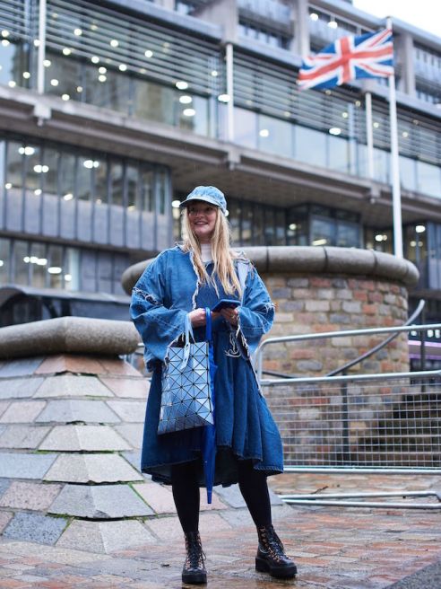 Kelly Harrington at London Fashion Week. With windy rain putting a damper on London Fashion Week, the street style set chose classic blue jeans to get them through long days.