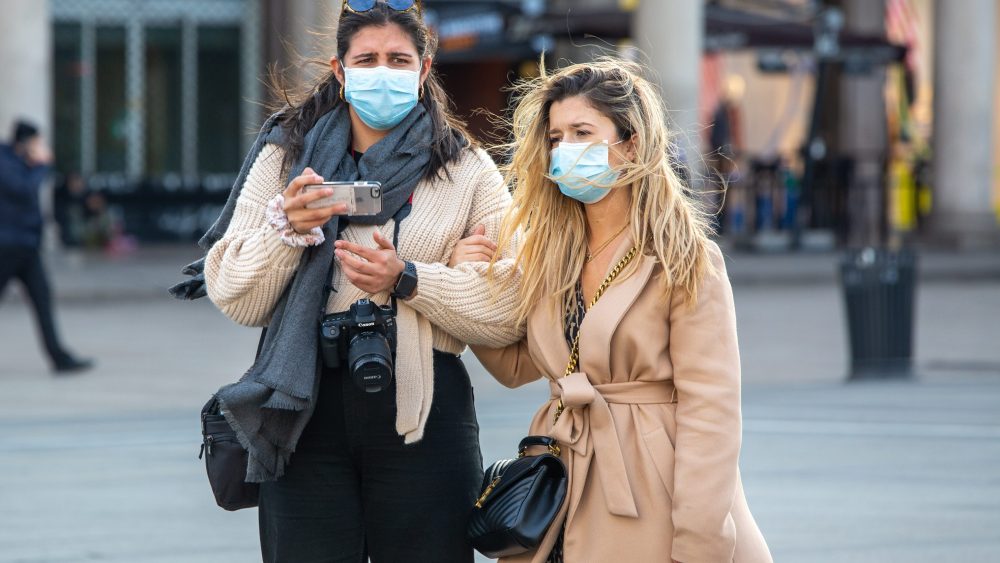 Pedestrians wearing face masks in Italy, which has witnessed a cluster outbreak of the coronavirus.