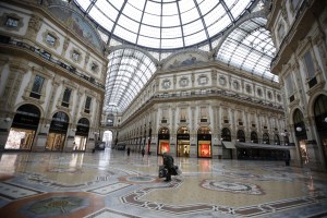 A nearly deserted Galleria Vittorio Emanuele II, Italy's oldest active shopping mall, in downtown Milan, Italy .