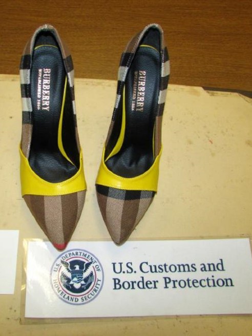 CBP seized a shipment of counterfeit goods with designer brands while inspecting express delivery parcels near Philadelphia Airport.