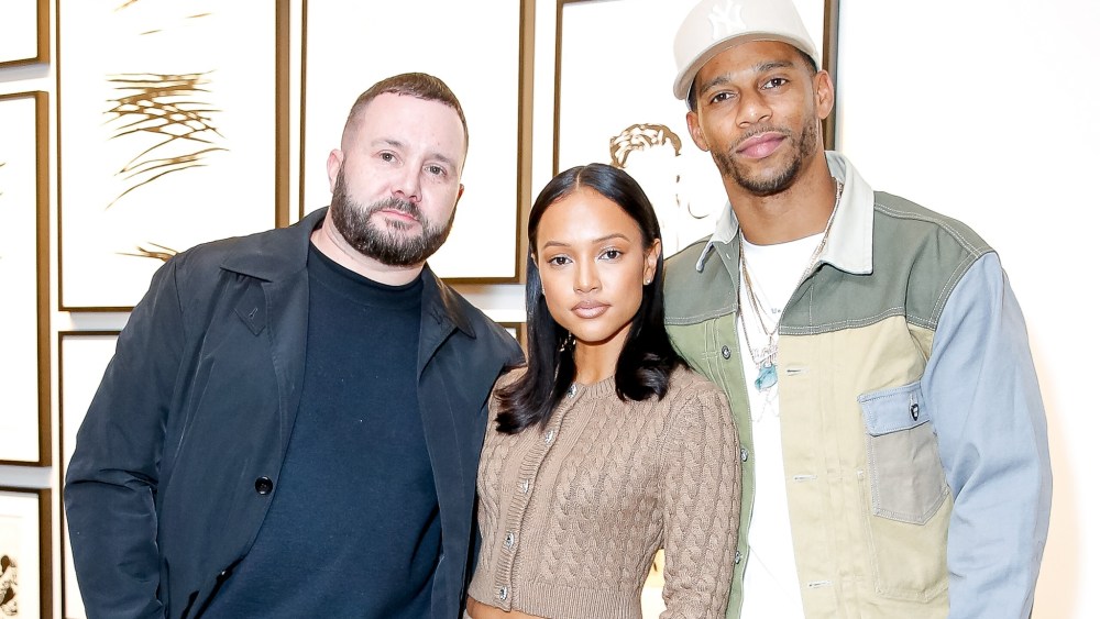 Kim Jones, Karrueche Tran and Victor Cruz.