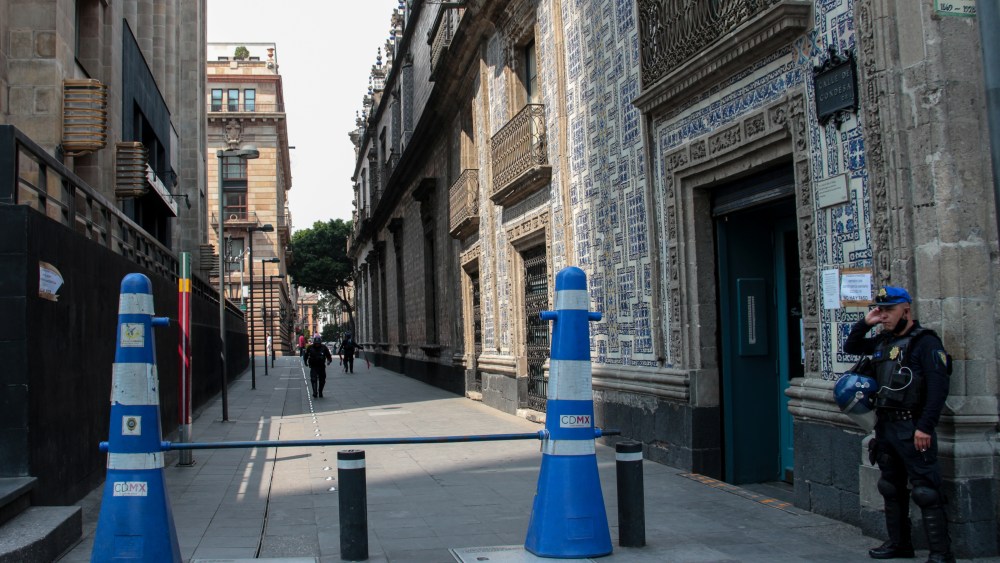 Police officers force close main streets of the downtown to cancel non-essential activities due to the COVID-19 health contingencyCoronavirus outbreak, Mexico City, Mexico - 01 Apr 2020