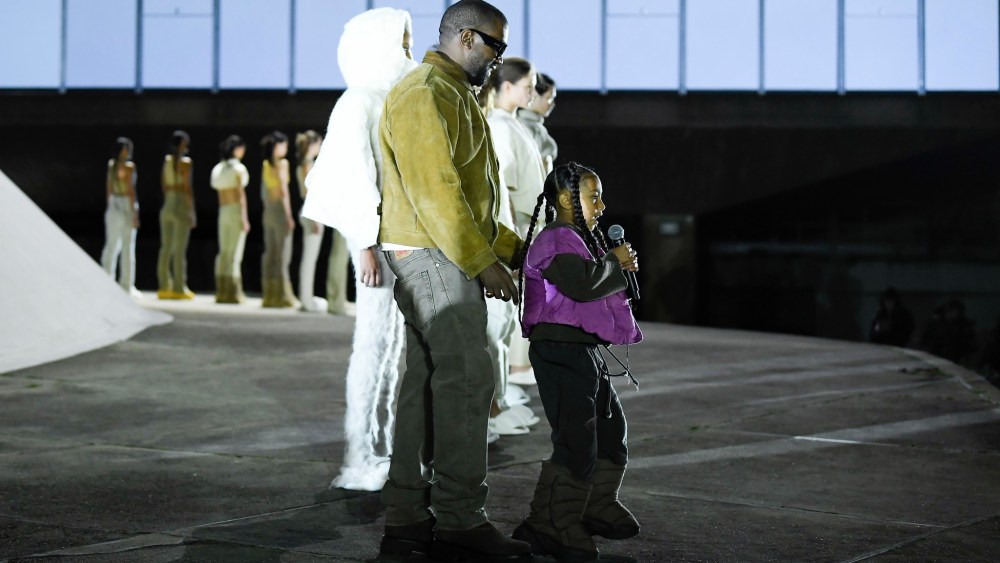Kanye West and North West on the catwalk.