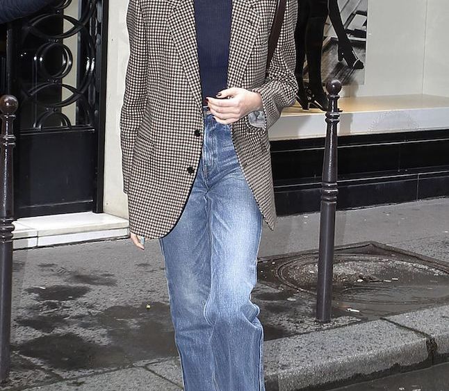 Paris Fashion Week street style saw looser denim looks with lower rises and menswear-inspired elements paired with flashier pieces.