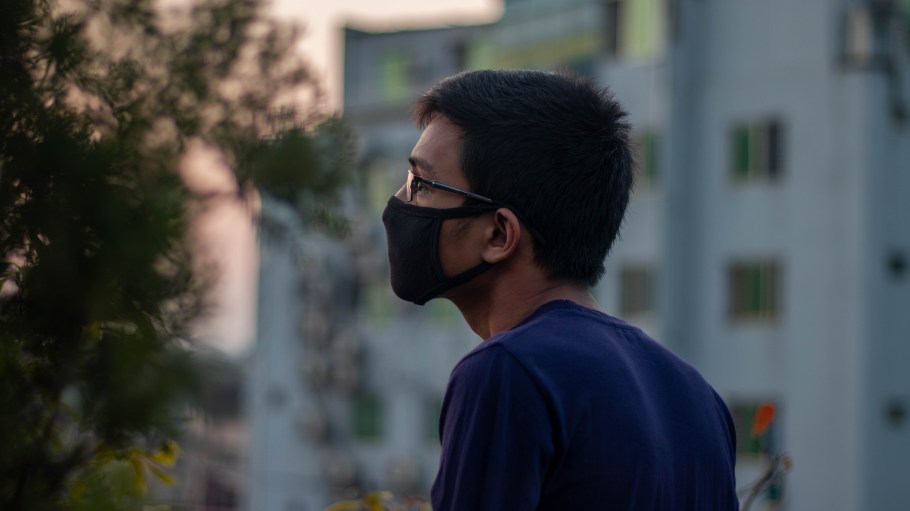 Bangladeshi boy wearing protection face mask against coronavirus outbreak COVID-19. Banner panorama medical staff preventive gear.People of Bangladesh wearing mask to protect themselves from covid-19