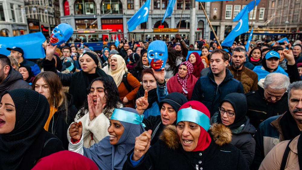 Protesters shout slogans during the demonstration.Hundreds of people gathered at the Dam Square to show their support with China's ethnic Uighurs.Protest in solidarity with the Uyghurs, Amsterdam, Netherlands - 29 Dec 2019The Chinese government has reportedly detained more than a million Muslims at re-education camps. Most of the people who were arbitrarily detained are Uighur, a predominantly Turkic-speaking ethnic group primarily from China's north-western region of Xinjiang. Human rights organisations, UN officials, and many foreign governments are urging China to stop the crackdown.