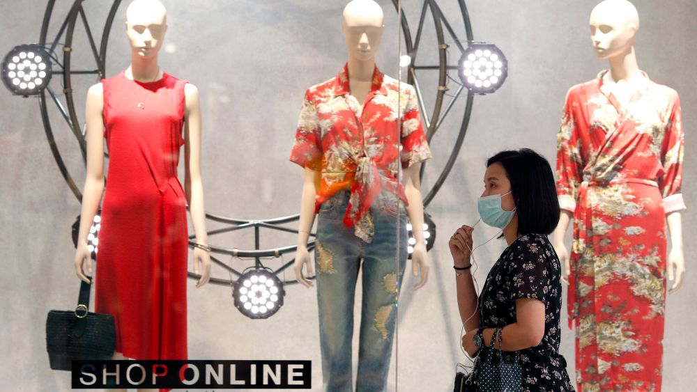 A shopper in Bangkok protects against the coronavirus.
