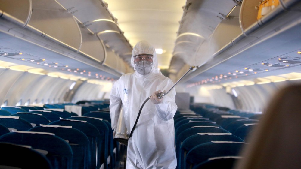 A worker sprays disinfectant as a precaution against the novel coronavirus, inside a Vietnam Airlines airplane at Noi Bai International Airport in Hanoi, Vietnam 03 March 2020. According to latest figures, all 16 people infected with coronavirus in Vietnam have recovered.Preventative measures against coronavirus outbreak, in Vietnam, Hanoi, Viet Nam - 03 Mar 2020