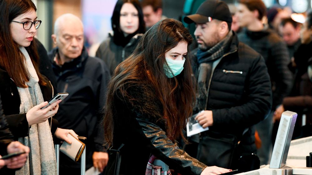 Travellers are protecting themselves against the Ccoronavirus at Charleroi AirportCoronavirus Outbreak, Brussels, Belgium - 03 Mar 2020