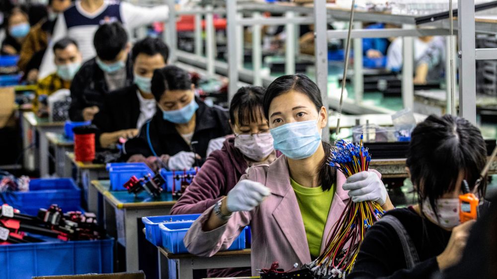 Workers at a factory in Shenzhen, China.