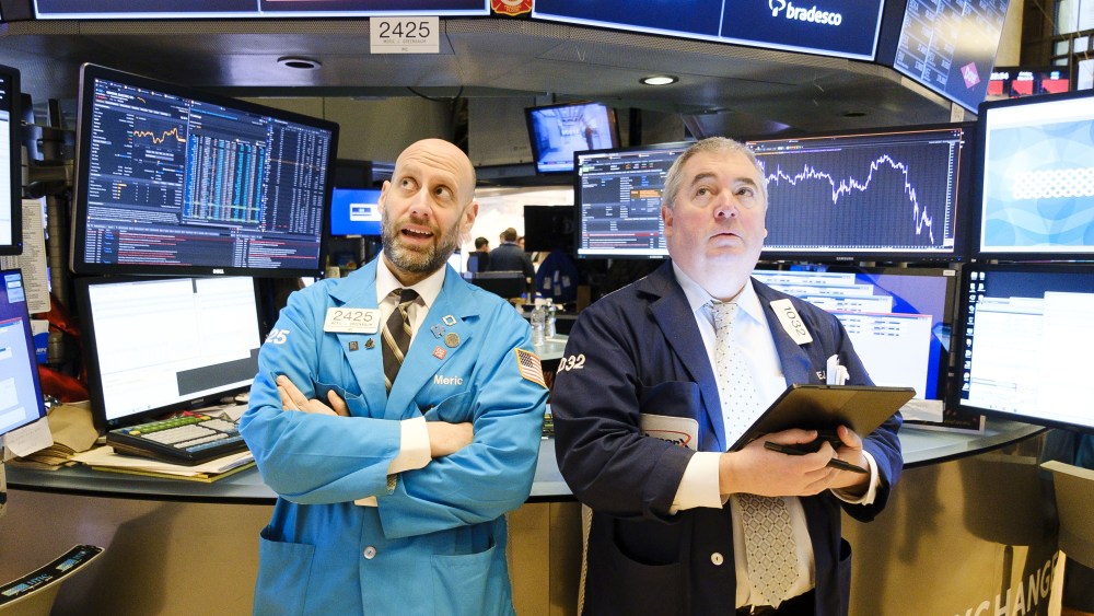 Traders work on the floor of the New York Stock Exchange.