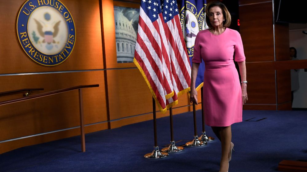House Speaker Nancy Pelosi of Calif., walks off of the stage after speaking during a news conference on Capitol Hill in WashingtonVirus Outbreak Congress, Washington, United States - 26 Mar 2020