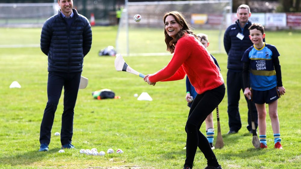 Kate Catherine Duchess of Cambridge, center, gestures as she tries hurling next to Britain's Prince William at Salthill Knocknacarra GAA Club in Galway, Ireland,. The Duke and Catherine Duchess of Cambridge visit Galway on the last of a three-day official visit to IrelandIreland Royals, Galway - 05 Mar 2020
