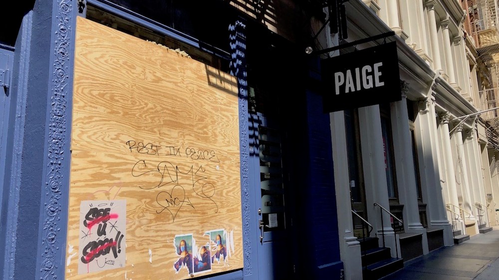 From emptied shelves, to boarded-up windows, denim retailers in New York City's Soho neighborhood prepared to shutdown for the long haul.