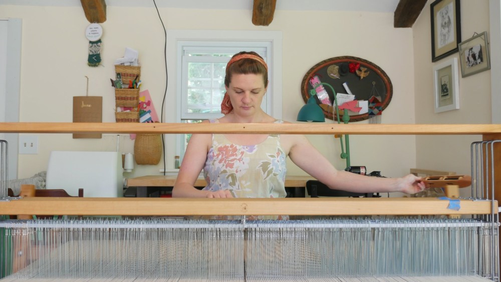 A weaver at work on the Connecticut-sourced project.