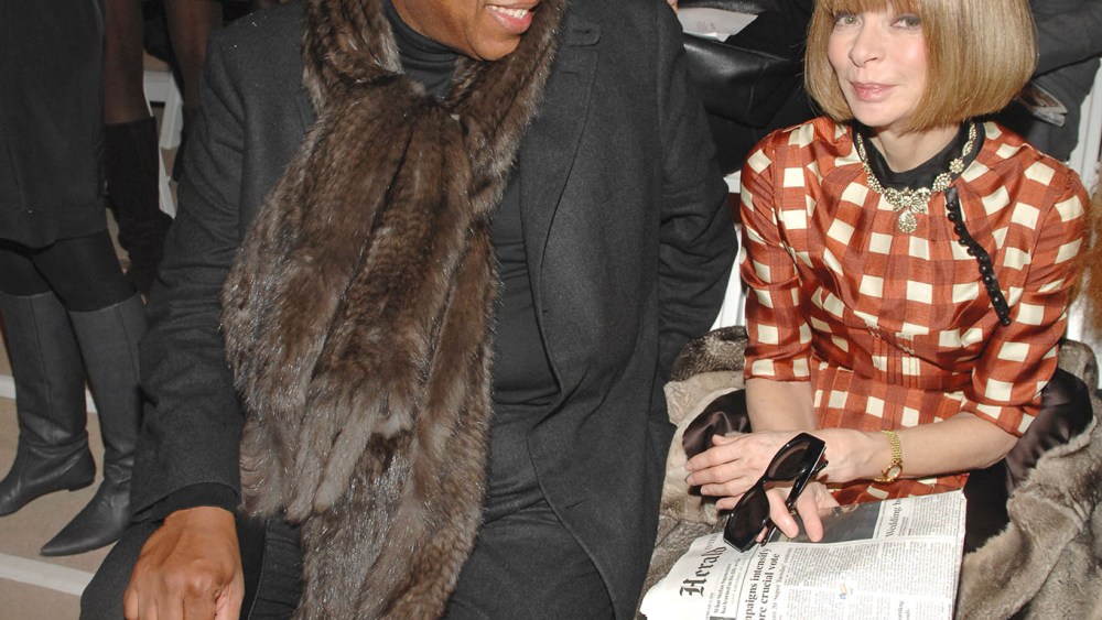 Andre Leon Talley (L) and Vogue's Anna Wintour attend Peter Som's fall 2008 runway show at Bryant Park's Promenade in New York City.