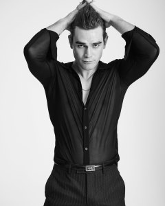 Versace’s viscose top, Alexander McQueen pinstripe cigarette trousers, and Gucci belt.