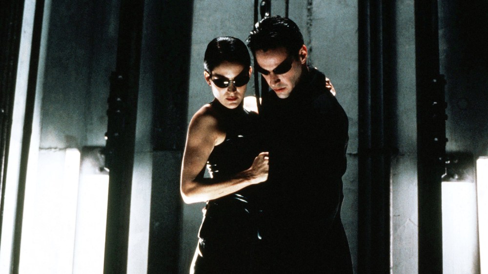 Editorial use only. No book cover usage.Mandatory Credit: Photo by Warner Bros/Village Roadshow Pictures/Kobal/Shutterstock (5886046ap)Carrie-Anne Moss, Keanu ReevesThe Matrix - 1999Director: Andy & Larry WachowskiWarner Bros/Village Roadshow PicturesUSAScene StillMatrix (La Matrice)