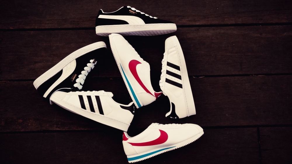 Footwear factory Pouyuen Vietnam, supplier to Nike and Adidas, suspends operations for two days amid coronavirus social distancing missteps.