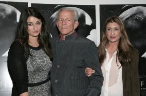Photographer Peter Beard, flanked by Zara Beard, left, and Nejma Khanum at a screening of "Blackfish" in New York, 2013.