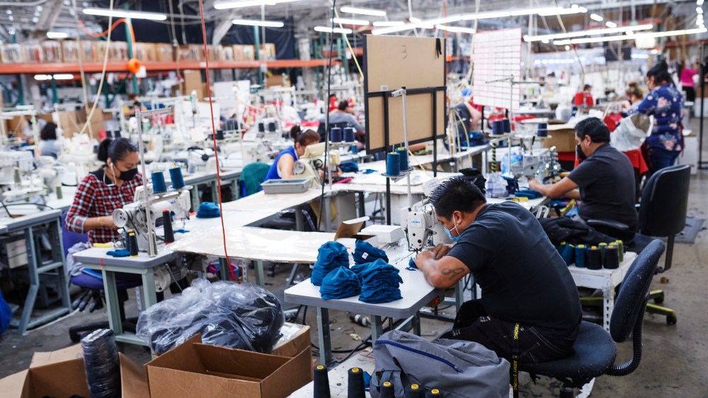 WorkersÕ sewing stations were moved 6 feet apart to comply with social distancing guidelines.