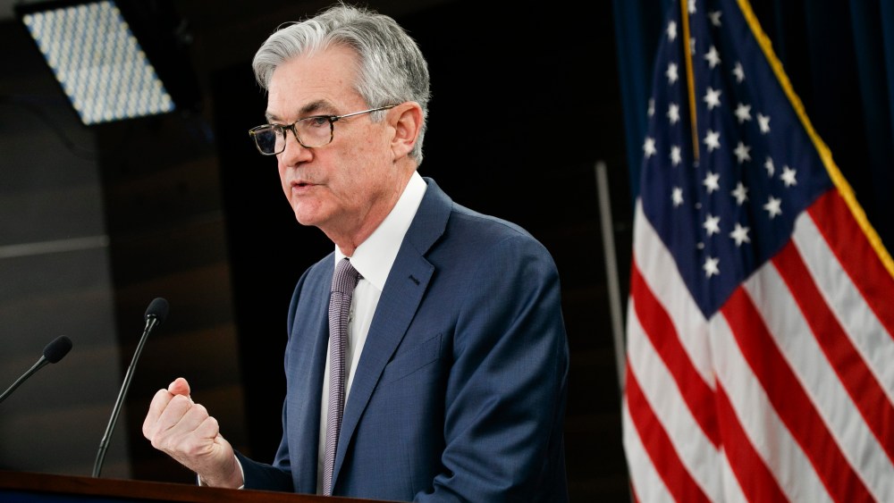 Federal Reserve Chair Jerome Powell with flag