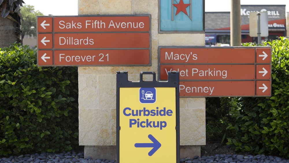 Sign directs shoppers to curbside pickup at North Star Mall in San Antonio, . Some retail stores are beginning to reopen Friday after weeks of closure due to the COVID-19 pandemicVirus Outbreak Texas, San Antonio, United States - 24 Apr 2020