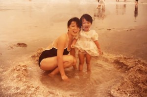 Claudia Li — "I think I was almost two years old. It was my first time going to a beach; my mom insisted on dressing me in a yellow dress instead of a swimsuit."