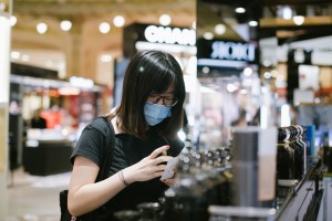 Chinese student Rui Jiang tests fragrances at the Galeries Lafayette flagship on Boulevard Haussmann in Paris.