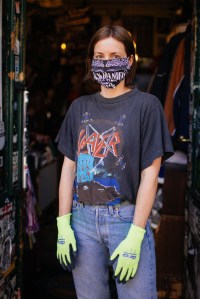 "Gloves are a normal thing, I used to wear them before. I have to carry a lot of heavy stuff and I need to protect my hands. The mask is a new addition. It's mostly for the costumers' comfort. I must say they look funny when worn together." — Julia, who works in Paul's Boutique vintage store in Prezlauer Berg