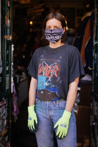 "Gloves are a normal thing, I used to wear them before. I have to carry a lot of heavy stuff and I need to protect my hands. The mask is a new addition. It's mostly for the costumers' comfort. I must say they look funny when worn together." — Julia, who works in Paul's Boutique vintage store in Prezlauer Berg