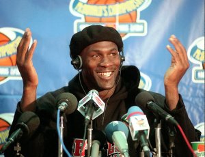 JORDAN FILES -Chicago Bulls player Michael Jordan gestures during a news conference at Bercy stadium in Paris . Michael Jordan is the richest athlete in the world, regaining the top spot on the Forbes magazine list for the fifth time in six years. Jordan will earn dlrs 78.3 million in 1997
USA SPORTSMEN INCOME, PARIS, France