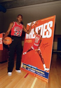 Chicago Bulls' Michael Jordan poses alongside his likeness on a box of Wheaties during an unveiling ceremony in Chicago, . Jordan is the seventh celebrity athlete to have his image displayed on a box of the cereal marketed as "The Breakfast of ChampionsBulls Jordan Wheaties 1988, Chicago, USA