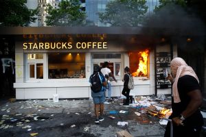 Starbucks store burns during a protest in Philadelphia,.