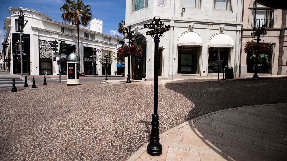 Rodeo Drive is empty and its luxury goods stores are closed amid the coronavirus pandemic in Beverly Hills, California, USA, 28 March 2020.Coronavirus - Covid-19 - Epidemic in Los Angeles, Beverly Hills, USA - 28 Mar 2020