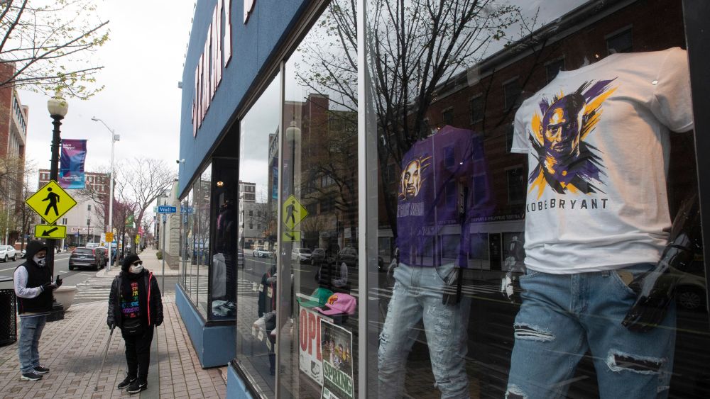shoppers face mask store window