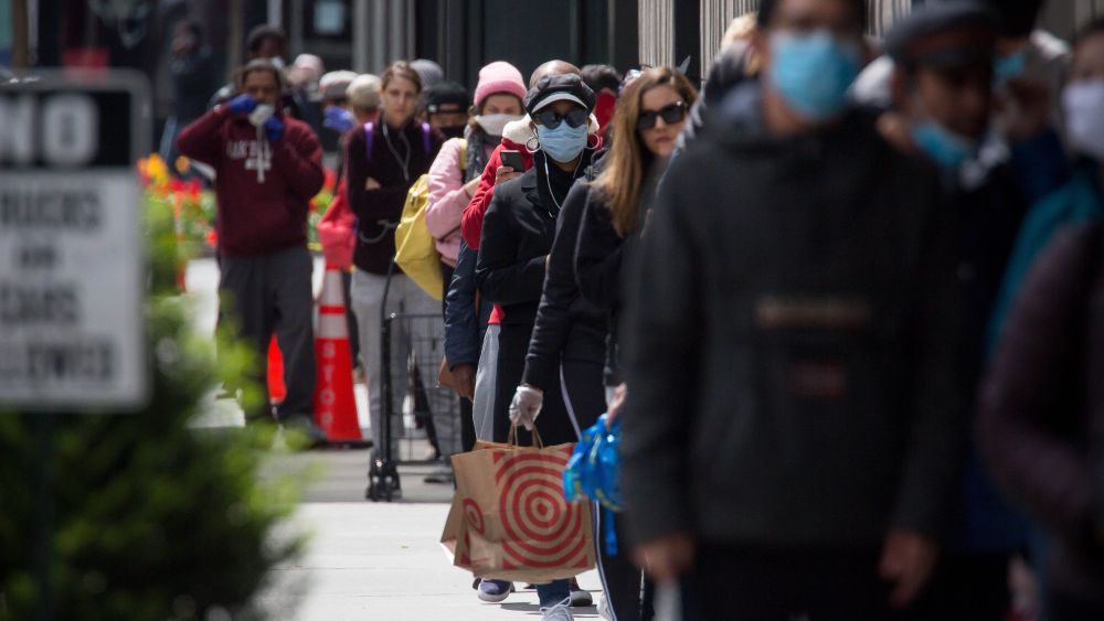 People waiting to shop amid the coronavirus pandemic in Brooklyn, NY.