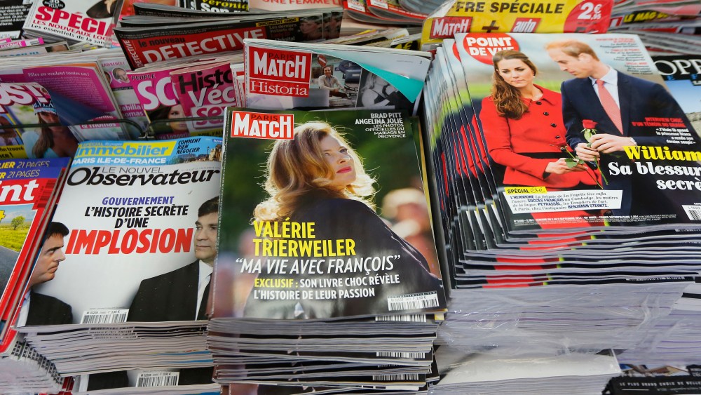A man buys a copy of Paris Match news magazine, in a Paris newsstand, with a photo of Valerie Trierweiler on the cover and the lead "My life with Francois". Former French first lady Valerie Trierweiler's book "Merci pour ce moment" (Thanks for this moment) relates her life at the presidential palace and will go on sale ThursdayFrance President Sex Life, Paris, France