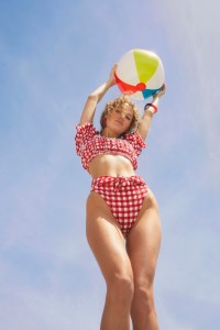 Montce’s polyester, nylon and spandex bikini. Tuza earrings and bracelet