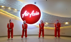 Air Asia PPE uniforms created by Filipino-American designer Puey Quinones.