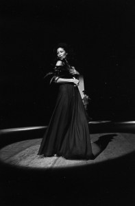 A model stands on the runway posing during the fashion show to benefit the restoration of the Chateau of Versailles, five American designers matching talents with five French couturiers at the Versailles Palace on November 28, 1973 in Versailles, France...Article title: 'One night and pouf! It's gone!Battle of Versailles, Versailles