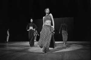 Models dressed in midriff-bearing tops and oversized bottoms of solids, stripes and plaids worn with headresses during the fashion show to benefit the restoration of the Chateau of Versailles, five American designers matching talents with five French couturiers at the Versailles Palace on November 28, 1973 in Versailles, France...Article title:'One night and pouf! It's gone!Battle of Versailles, Versailles