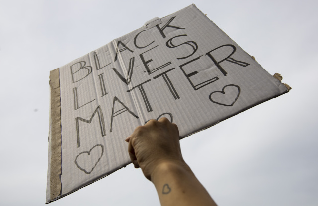 People take part in a Black Lives Matter protest in Amsterdam, Netherlands, to protest against the recent killing of George Floyd, a black man who died in police custody in Minneapolis, U.S.A., after being restrained by police officers on Memorial DayAmerica Protests , Amsterdam, Netherlands - 01 Jun 2020