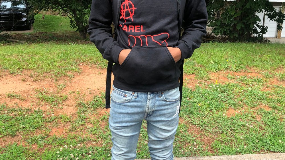 Keith Riley wearing a design from his Denied Apparel collection.