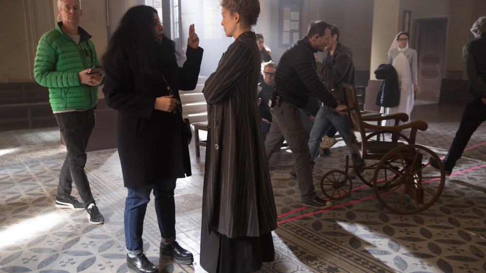 Marjane Satrapi and Rosamund Pike on the set of "Radioactive."