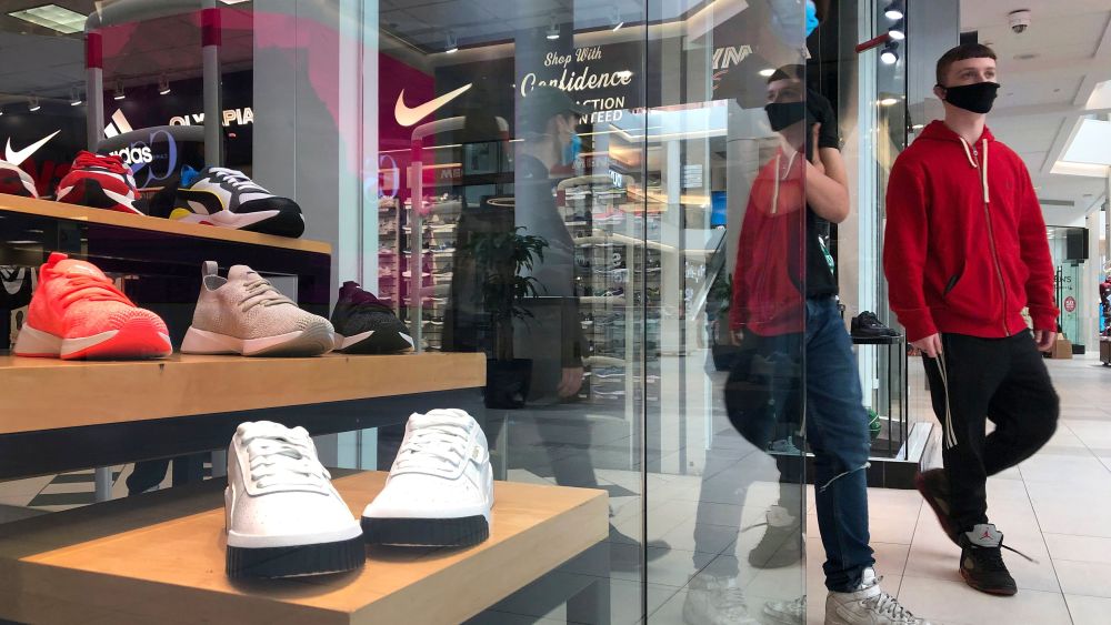 shopper with mask leaves nike store