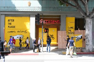 Wasteland, a resale boutique in Santa Monica, being reboarded up after overnight looting.