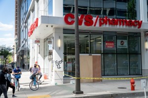 A CVS sustains property damage after looting in Philadelphia.