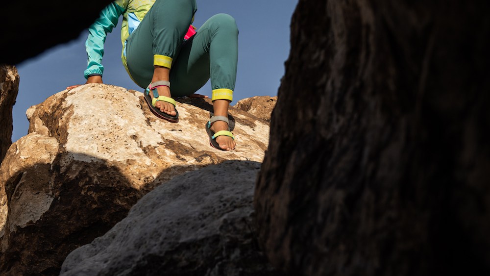 Outdoor-oriented footwear brand Teva and Cotopaxi collaborated on a sporty sandal and windbreaker with recycled and upcycled materials.